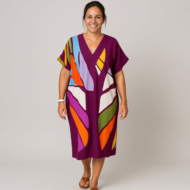 Ruby | Handgefertigtes Premium-Kleid mit buntem Blätterdruck